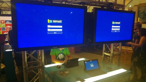 The TeamworkPM App for Windows 8 I developed on the 2 big displays and the Surface Pro I wrote it on